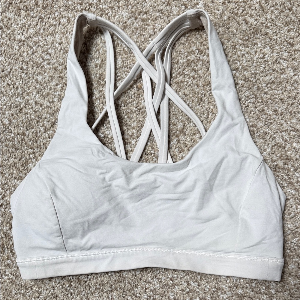 Lululemon sports bra with removable pads. Size 4, white